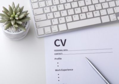 CV letter, pen, laptop